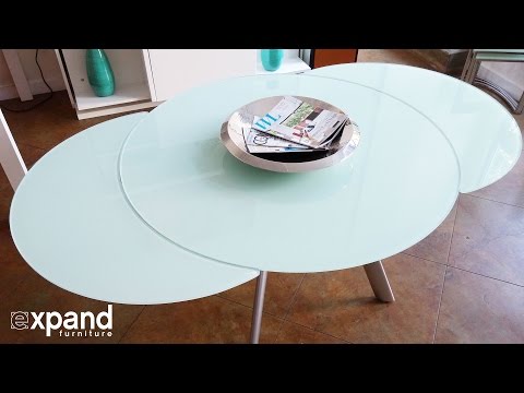 Butterfly Round Glass extending table demonstration