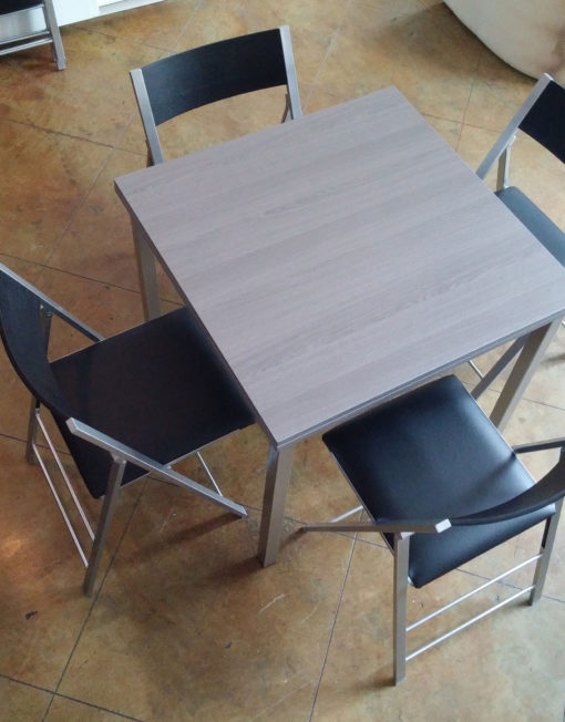 converting-Echo-Square-table-with-4-black-folding-chairs