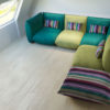 Basso-modular-low-profile-sofa-set-in-green-and-striped-colors
