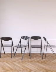 Magro-Thin-Grey-Folding-Chairs-in-white-room-with-trendy-wood-floor-Expand-Furniture